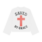 White sweatshirt with 'Saved by Grace' text and red cross on a white background